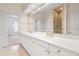 Bathroom boasts double vanity, large mirror, and shower at 3657 Peachtree Ne Rd # 3C, Atlanta, GA 30319