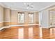 Large bedroom with hardwood floors and access to balcony at 3657 Peachtree Ne Rd # 3C, Atlanta, GA 30319