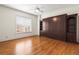 Bedroom with hardwood floors and a Murphy bed at 3657 Peachtree Ne Rd # 3C, Atlanta, GA 30319