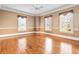 Hardwood floor bedroom with neutral walls and crown molding at 3657 Peachtree Ne Rd # 3C, Atlanta, GA 30319