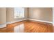 Bright bedroom with hardwood floors and a large window at 3657 Peachtree Ne Rd # 3C, Atlanta, GA 30319