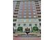 Brick building with balconies and central fountain at 3657 Peachtree Ne Rd # 3C, Atlanta, GA 30319