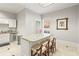 Modern kitchen with white cabinets and granite countertops at 3657 Peachtree Ne Rd # 3C, Atlanta, GA 30319