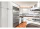 Modern kitchen featuring stainless steel refrigerator and hardwood floors at 3657 Peachtree Ne Rd # 3C, Atlanta, GA 30319