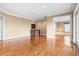 Bright living room with hardwood floors and wet bar at 3657 Peachtree Ne Rd # 3C, Atlanta, GA 30319