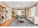Spacious living room with hardwood floors and large windows at 3657 Peachtree Ne Rd # 3C, Atlanta, GA 30319