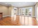 Spacious living area with hardwood floors and French doors to balcony at 3657 Peachtree Ne Rd # 3C, Atlanta, GA 30319