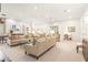 Spacious living room, featuring ample seating and a large TV at 3657 Peachtree Ne Rd # 3C, Atlanta, GA 30319