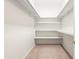 Large walk-in closet with shelving and carpeting at 3657 Peachtree Ne Rd # 3C, Atlanta, GA 30319