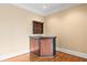 Built-in wet bar with wood cabinets and shelving at 3657 Peachtree Ne Rd # 3C, Atlanta, GA 30319