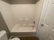 Clean bathroom with a bathtub and shower combination at 5787 Summerglenn Ln, Atlanta, GA 30349