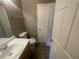 Bathroom with a sink, toilet and linen closet at 5787 Summerglenn Ln, Atlanta, GA 30349