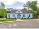 White pool house with gray roof and black shutters at 1700 Fulmont Cir, Mableton, GA 30126