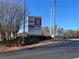 Shopping center sign with various stores listed at 1700 Fulmont Cir, Mableton, GA 30126