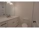 Bathroom with a white vanity, modern fixtures, and a toilet at 3007 Holly St, Canton, GA 30115