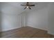 An empty bedroom featuring gorgeous floors, recessed lighting, and two closets at 3007 Holly St, Canton, GA 30115