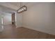 Bright dining room features stylish lighting and neutral tones at 3007 Holly St, Canton, GA 30115