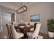 Bright dining room features stylish lighting, seating for six, and neutral tones at 3007 Holly St, Canton, GA 30115