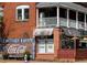 Exterior of Grant Park Coffee shop with Coca-Cola mural and outdoor seating area at 353 Skylar Se Way, Atlanta, GA 30315