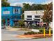 Exterior view of restaurants Beacon and Patria Cocina with outdoor seating and lush landscaping at 353 Skylar Se Way, Atlanta, GA 30315