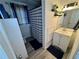 Clean bathroom with shower/tub combo and updated vanity at 6828 Delta Dr, Riverdale, GA 30274