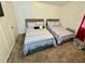 Bedroom with two full beds, offering ample sleeping space at 6828 Delta Dr, Riverdale, GA 30274