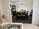 Dining room with dark wood table and chairs at 6828 Delta Dr, Riverdale, GA 30274