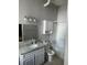 Full bathroom with granite vanity and updated fixtures at 20 Marietta Nw St # 13F, Atlanta, GA 30303