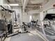 Well-equipped gym with weight machines, treadmills, and free weights at 20 Marietta Nw St # 13F, Atlanta, GA 30303