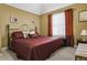 Large bedroom with king-size bed and calming decor at 5511 E Stoneway Ct, Villa Rica, GA 30180