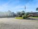 Community entrance with flagpole and landscaping at 475 Mount Vernon Ne Hwy, Atlanta, GA 30328