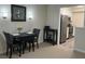 Dining area with a table and chairs, kitchen view at 475 Mount Vernon Ne Hwy, Atlanta, GA 30328