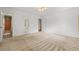 Spacious main bedroom with carpet flooring and multiple doorways at 282 Evelyn Nw St, Marietta, GA 30064
