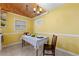 Cozy dining area with yellow walls and tile flooring at 282 Evelyn Nw St, Marietta, GA 30064