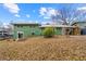 Home exterior showing a spacious backyard and driveway with parking at 282 Evelyn Nw St, Marietta, GA 30064