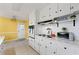 Well-equipped kitchen featuring white cabinets and a functional layout at 282 Evelyn Nw St, Marietta, GA 30064