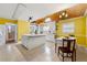 Bright kitchen featuring an island, white cabinetry, and eat-in area at 282 Evelyn Nw St, Marietta, GA 30064