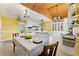 Spacious kitchen featuring an island, white cabinets, and wood-paneled ceiling at 282 Evelyn Nw St, Marietta, GA 30064