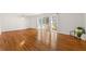 Bright living room featuring hardwood floors and access to the backyard at 282 Evelyn Nw St, Marietta, GA 30064