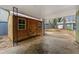 A lovely wood shed on a concrete foundation with an overhang at 282 Evelyn Nw St, Marietta, GA 30064