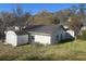 Backyard view featuring an outbuilding, providing additional storage and enhancing property value at 5121 Newark Ave, Clarkdale, GA 30111