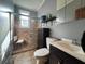 Bathroom featuring a shower, toilet, vanity and other features at 5121 Newark Ave, Clarkdale, GA 30111