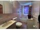 Bathroom featuring a tub, toilet, vanity and other features at 5121 Newark Ave, Clarkdale, GA 30111