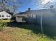 Cozy home featuring a well-maintained lawn, a stone walkway, and inviting greenery for a serene and welcoming atmosphere at 5121 Newark Ave, Clarkdale, GA 30111