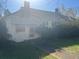 Traditional-style home featuring a well-maintained lawn, inviting walkway, and mature landscaping for a serene setting at 5121 Newark Ave, Clarkdale, GA 30111