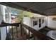 Covered patio with a view of the backyard and detached storage unit, great for relaxation and extra space at 5121 Newark Ave, Clarkdale, GA 30111