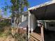 Exterior view of the home with a covered ramp providing convenient access at 5121 Newark Ave, Clarkdale, GA 30111