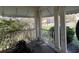 Enclosed front porch with decorative columns, railing and covered ceilings at 5121 Newark Ave, Clarkdale, GA 30111