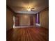 Living room with hardwood floors and natural light creates a welcoming, spacious atmosphere at 5121 Newark Ave, Clarkdale, GA 30111