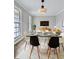 Modern dining room with an open concept feel, plenty of seating and natural light at 4449 Inns Brook Dr, Snellville, GA 30039